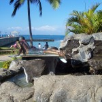 Surfing kid statue